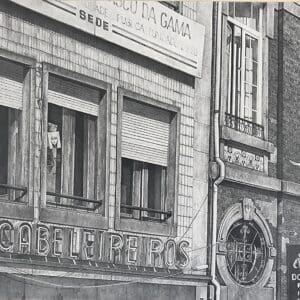 A black and white photo of an old building.