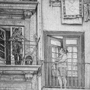 A man standing on the balcony of his house