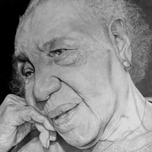 Black-and-white portrait of an elderly person with a thoughtful expression.